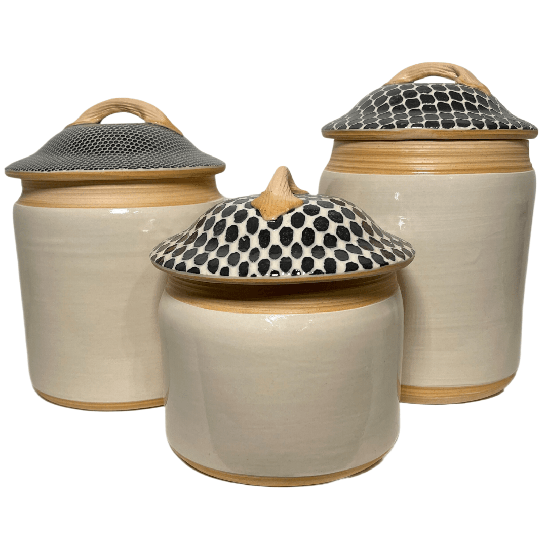 Three Piece Canister Set/ Ivory Base W/ Assorted Black Lids
